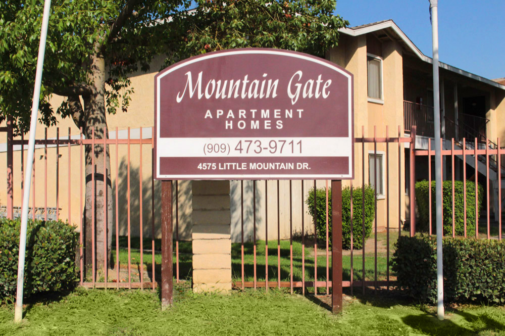 This image shows the entrance marker photo of Mountain Gate Apartments