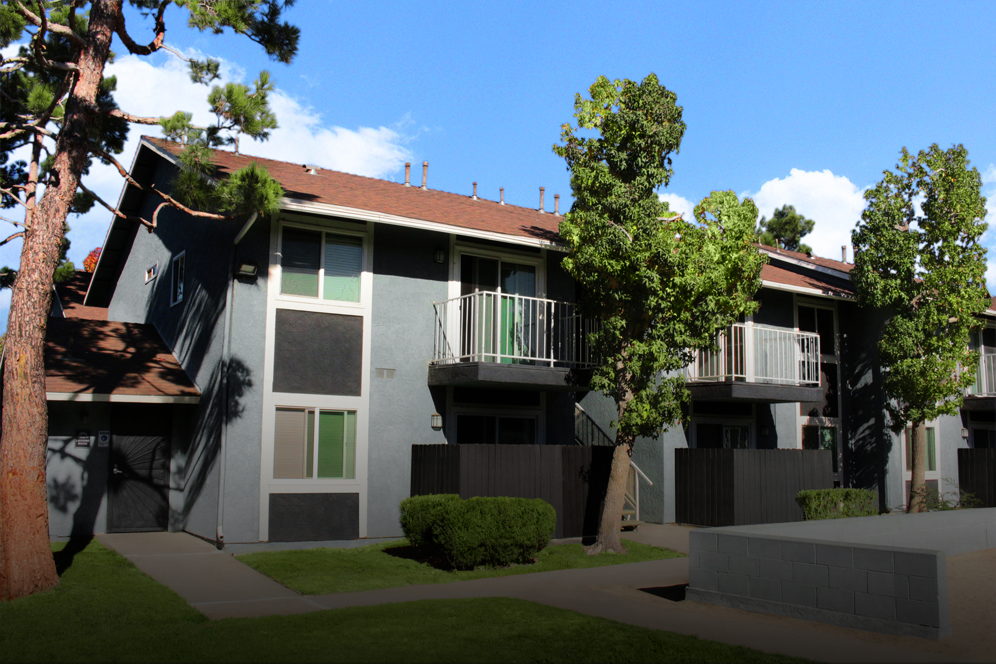 This banner image shows the exterior photo of Parc Mountain View Apartments