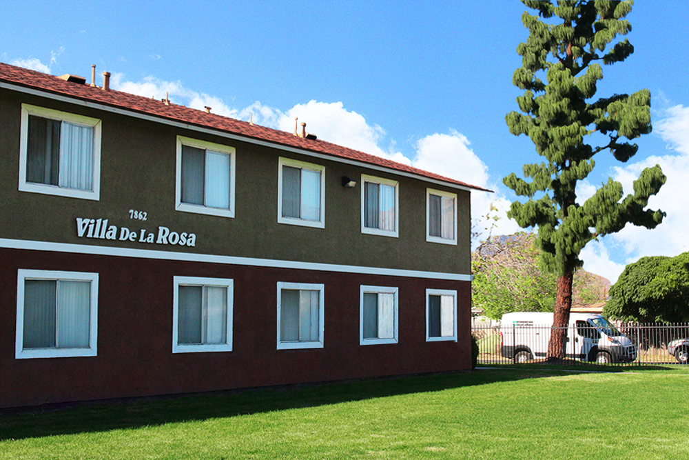 This image shows the exterior photo of Villa De La Rosa Apartments
