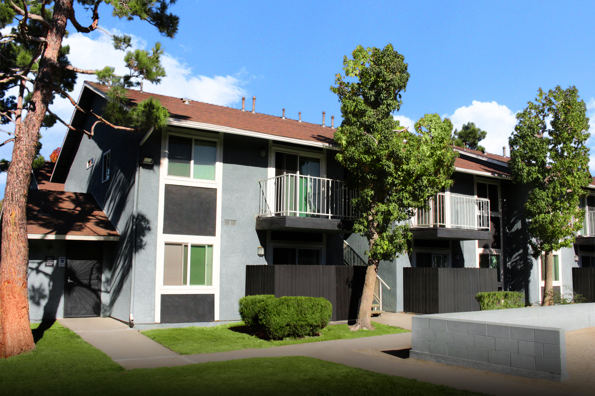 This banner image shows the exterior photo of Parc Mountain View Apartments